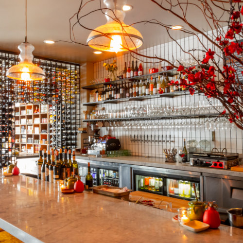 Bar area with many bottles and decorations